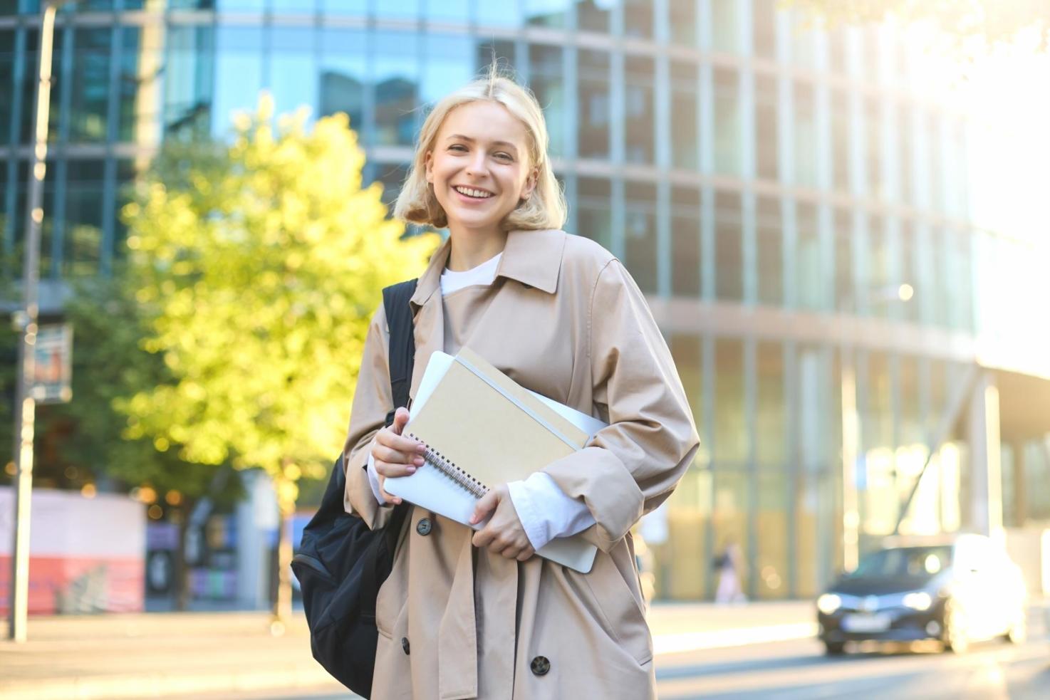 Group of adults collaborating on financial planning exercises around a table with budgeting worksheets and calculators